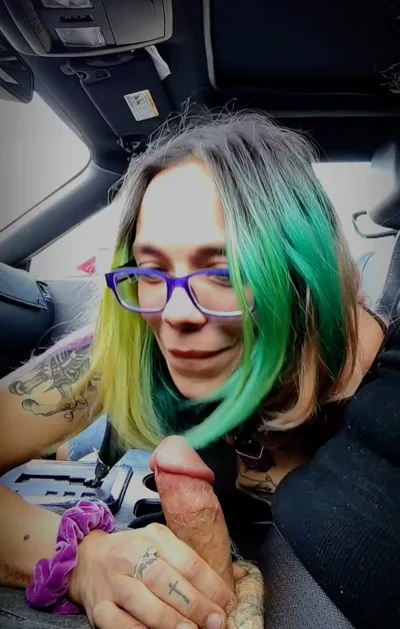 Nerdy chick in glasses gives a roadhead with a hot blowjob and gets a tattoo
