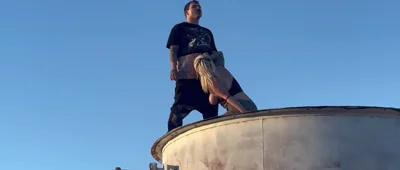 Justanicecock's big boobs bounce while getting drilled from behind on top of a water tower