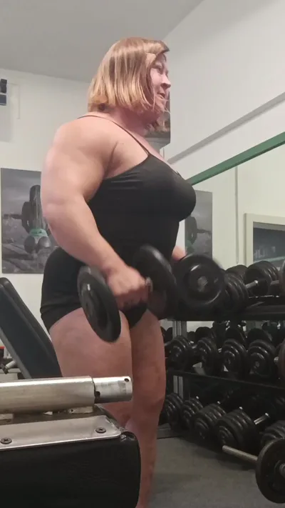 Anna K Powerlifter dominates & humiliates with her sexy feet in latex