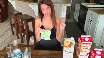 Hot brunette milf with multiple vids shows off her cooking skills while wearing leggings and food-free face