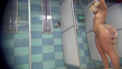 Hidden Zone spycam catches up with upskirt voyeur in beachcabin shower