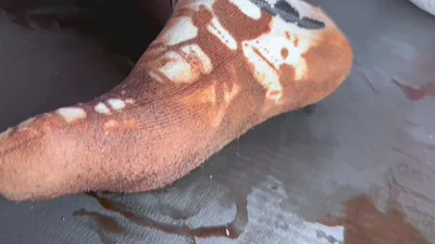 Watch Paradise Jessie lick herself in chocolate and taste it from her socks