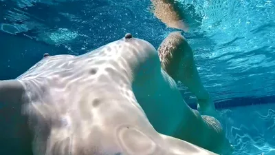 Stepmom Rhea Sweet enjoys getting her hairy pussy soaked in the pool