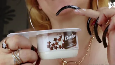 Watch Lora Long nail Aka Loralongnails in exclusive solo video eating yogurt, licking and foot fetish domination