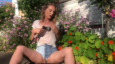 Watch Mona Wales get wild with her garden hose & get a wet and wild look