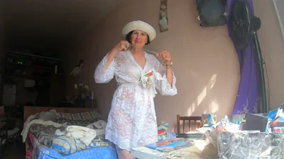 Mimi Schwarz, the straight-haired gilf, gets seduced by a hot guy in satin lingerie