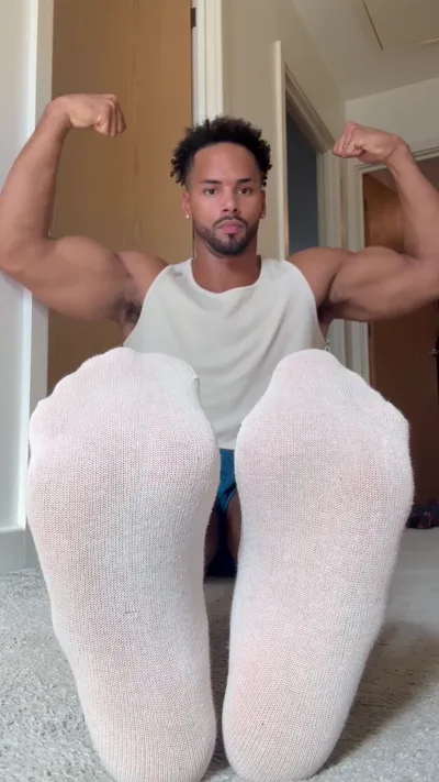 Alpha Andre Aka dominates in exclusive femdom video with her thin white socks & bicep flexing