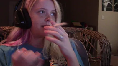 Nerdgibbler gets her blonde hair wet while smoking and rating a huge cock