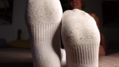 Watch Goddess Miss Jade get off on foot worship and sneaker sniffing