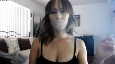 Goddess Miss Jade dominates with smoke and goddess worship in this sensual femdom video