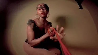 Goddess Hynes dominates her slave with her feet & latex