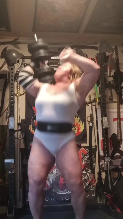 Anna K Powerlifter dominates naked and top set with her latex fetish