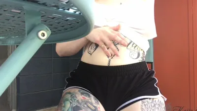 Kaiia Eve's many tattoos and bellybutton play in the coffee shop