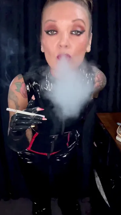 Smoking Vixen dominates with kinky femdom and kinky pee fetish