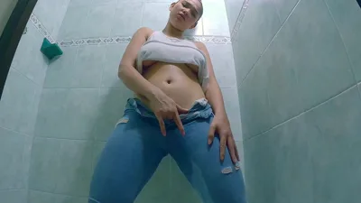 CFGIRLS sensually strips and wets her jeans in hot shower scene