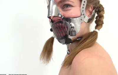 Annika The Carrara Mask's metal bondage will make you want to play with her in a different way