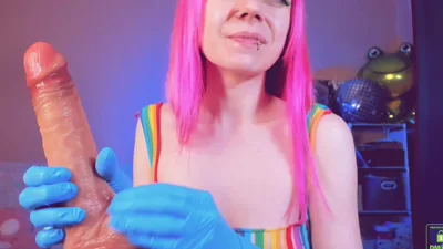 AmilyRose69 gives a wet and wild handjob with gloves