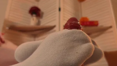 Ashley Bardot gets her feet worshipped while wearing kneehighs & barefoot
