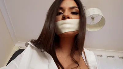 Zaramae's escape challenge: Milf gets tied up, gagged & dominated by tape
