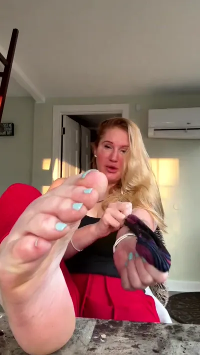 Goddesskat dominates your life with her kinky solo play and real-life foot fetish