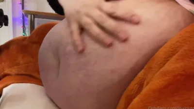Lisalou Aka Lisaloussbbw's OnlyFans get a sneak peek of her belly resting on the bed