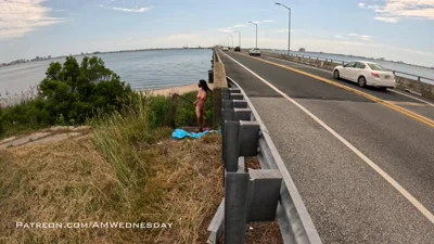 Amateur Amwednesday Bridge strips down and rides a bike in promenade