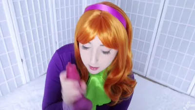 Watch Daphne, the hot cosplay babe, give a sloppy BJ to Scooby Manyvids